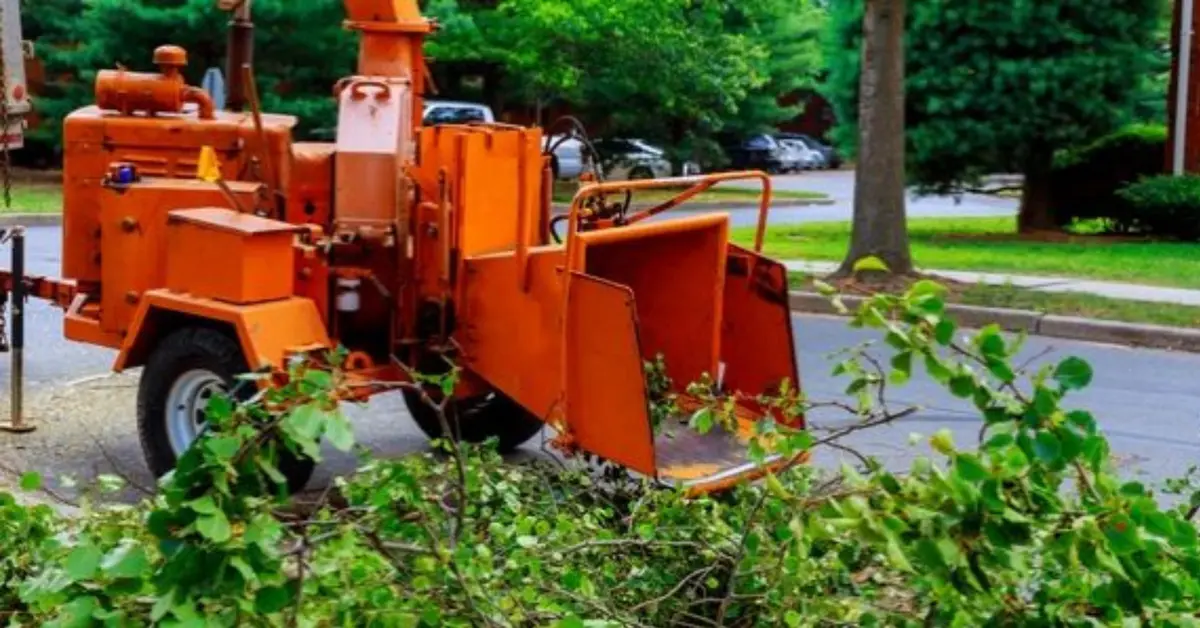 Tree service crew working near a residential property in Fultondale, AL